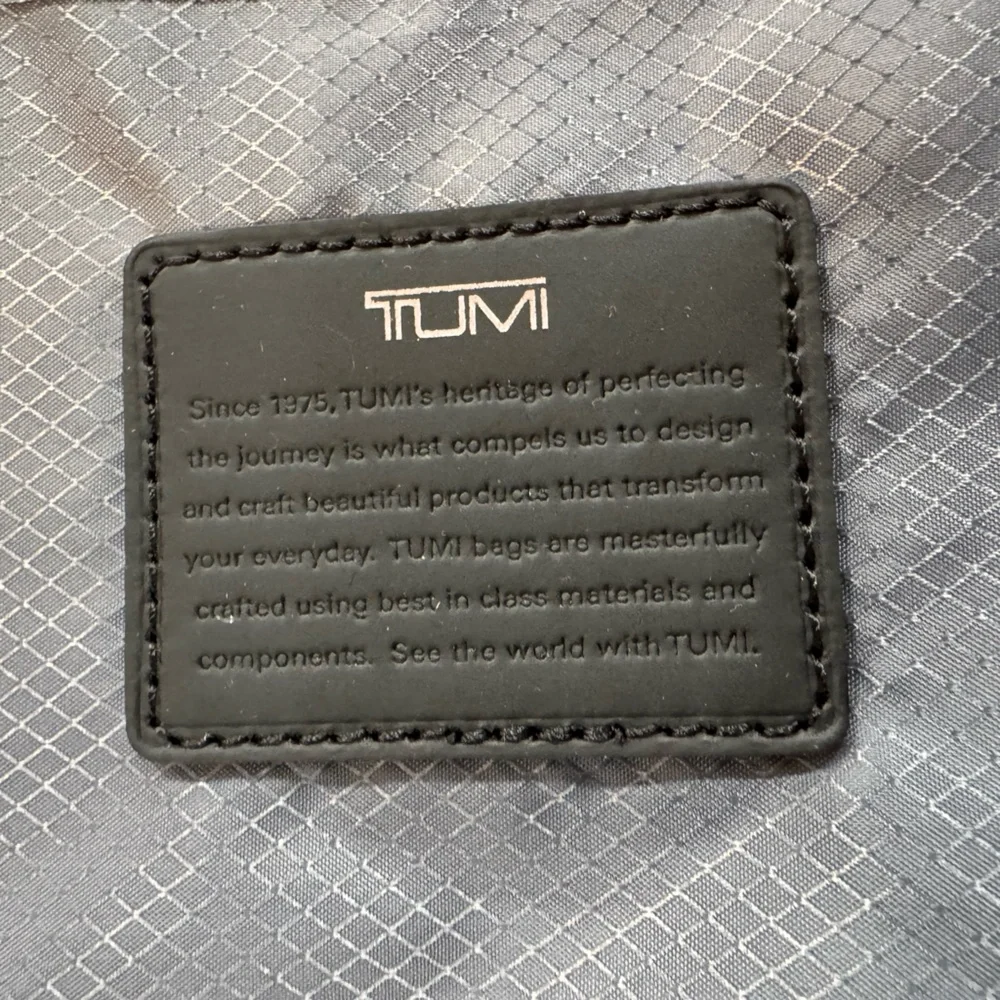 TUMI Merge International Front Lid 4 Wheeled Carry-On